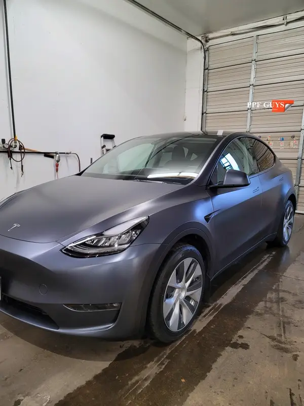 Silver Tesla Model Y, Stealth. Photo 20 of 29.