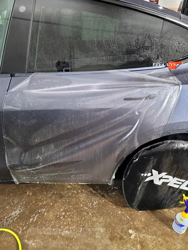 Silver Tesla Model Y, Stealth. Photo 14 of 29.