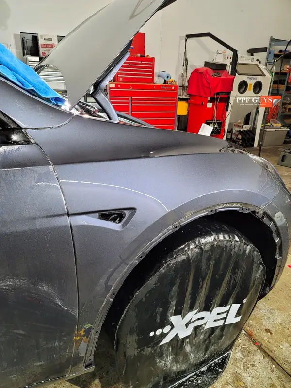 Silver Tesla Model Y, PPF. Photo 14 of 25.