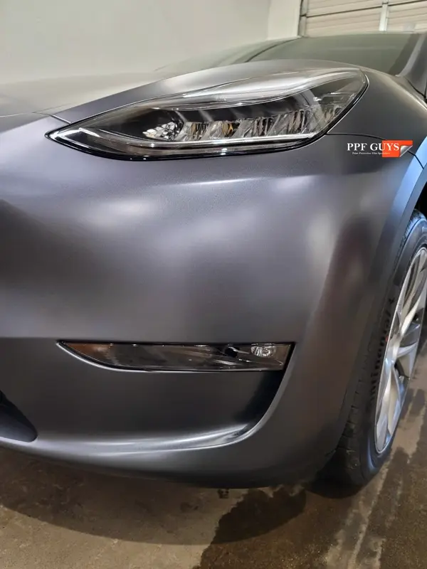 Silver Tesla Model Y, Stealth. Photo 22 of 29.