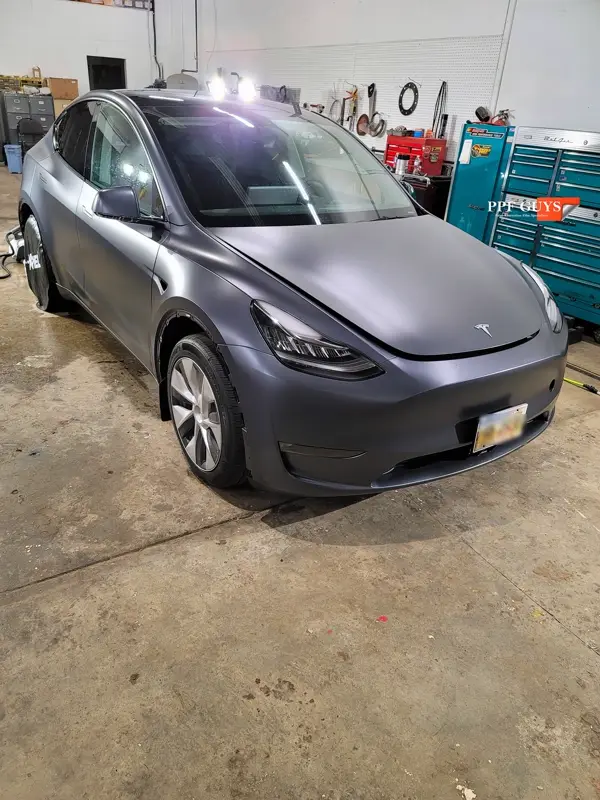 Silver Tesla Model Y, Stealth. Photo 9 of 29.