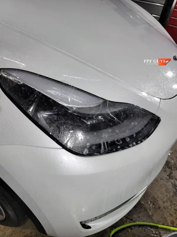 White Tesla Model Y, Stealth. Photo 26 of 42.