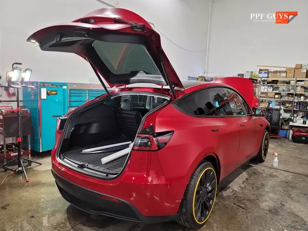 Red Tesla Model Y, Stealth. Photo 21 of 48.
