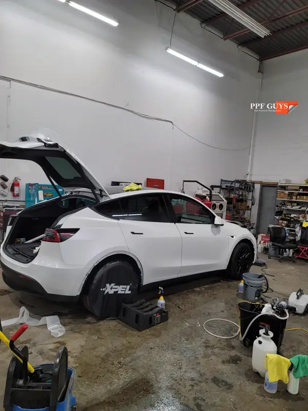White Tesla Model Y, Full body XPEL Stealth satin finish PPF. Photo 26 of 54.
