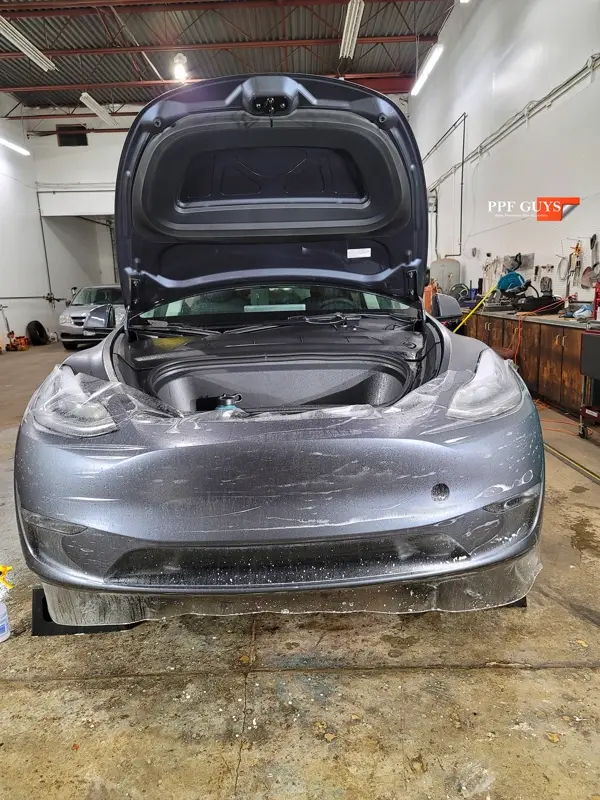 Silver Tesla Model Y, Stealth. Photo 27 of 29.