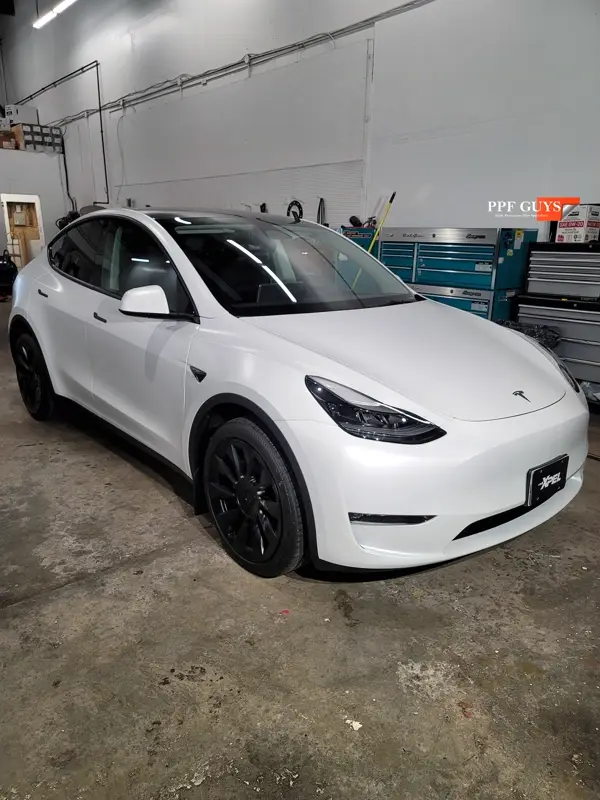 White Tesla Model Y, Full body XPEL Stealth satin finish PPF. Photo 30 of 54.