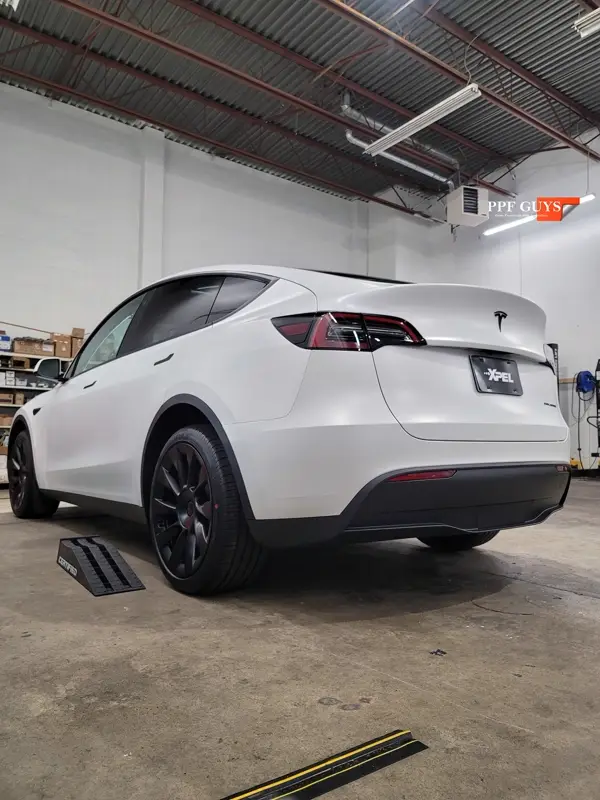 White Tesla Model Y, Full body XPEL Stealth satin finish PPF. Photo 38 of 54.