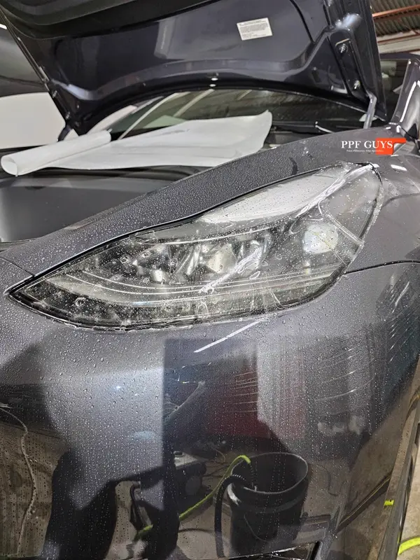 Silver Tesla Model Y, Full body Ultimate Fusion, blacked out emblems. Photo 24 of 45.