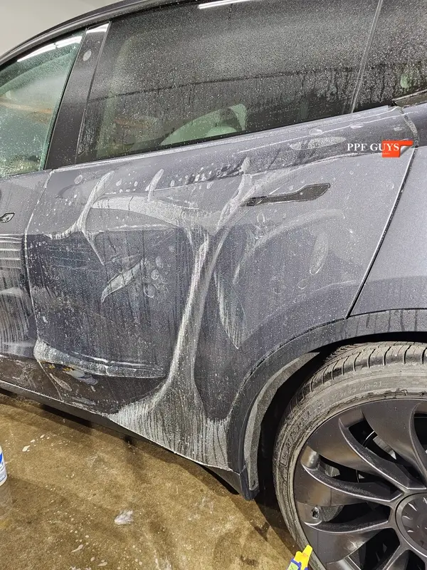 Silver Tesla Model Y, Full body Ultimate Fusion, blacked out emblems. Photo 20 of 45.