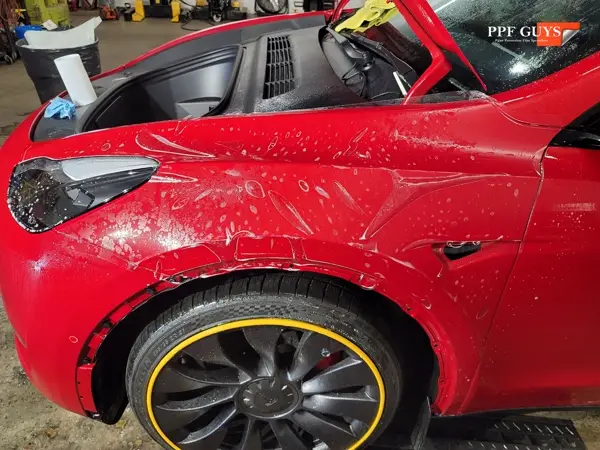 Red Tesla Model Y, Stealth. Photo 45 of 48.