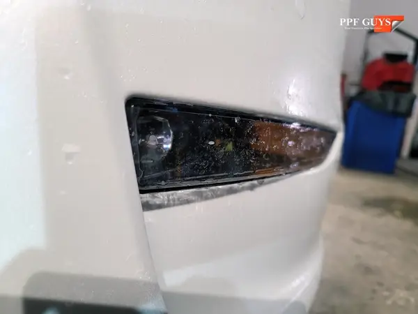 White Tesla Model Y, XPEL Stealth, ceramic, painted emblems. Photo 11 of 34.