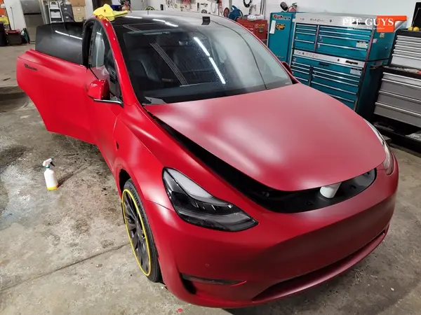 Red Tesla Model Y, Stealth. Photo 15 of 48.