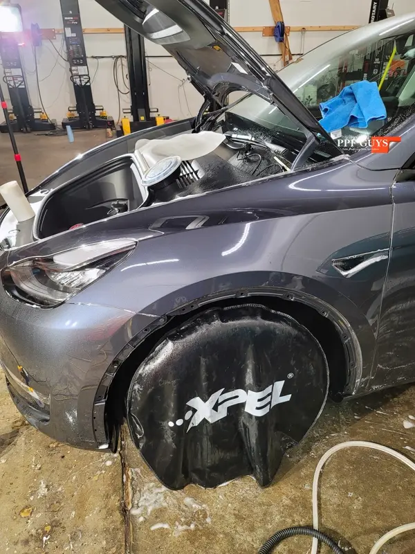 Silver Tesla Model Y, PPF. Photo 18 of 25.