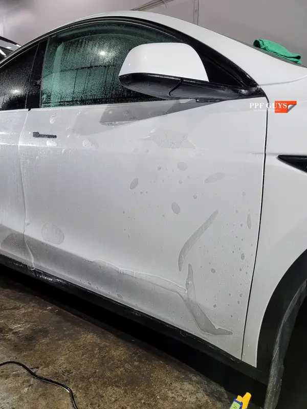 White Tesla Model Y, Stealth. Photo 27 of 42.