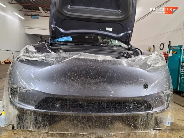 Silver Tesla Model Y, PPF. Photo 11 of 25.