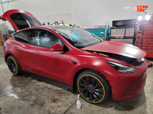 Red Tesla Model Y, Stealth. Photo 18 of 48.