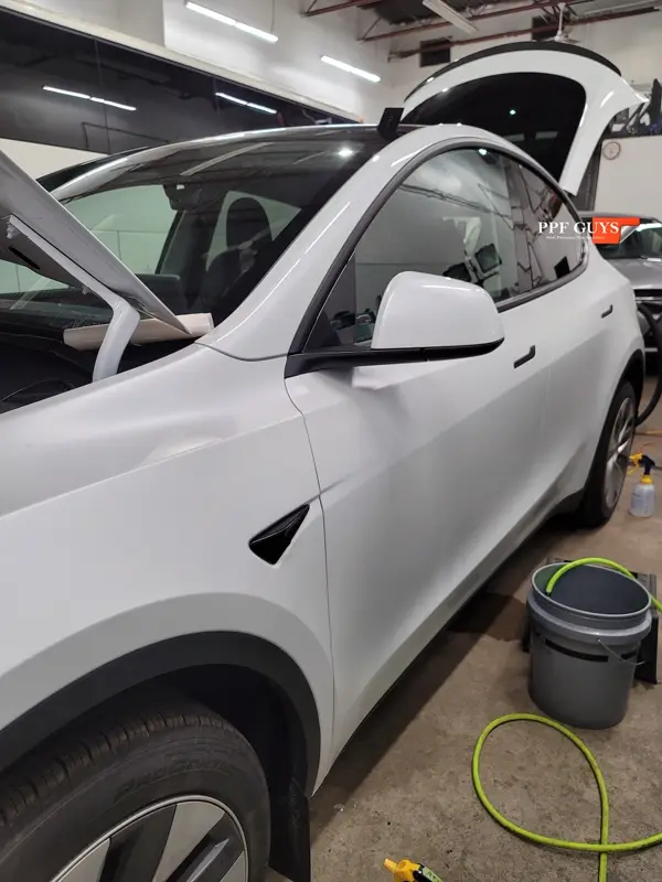 White Tesla Model Y, Stealth. Photo 35 of 42.