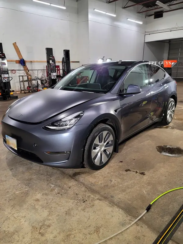 Silver Tesla Model Y, Stealth. Photo 10 of 29.