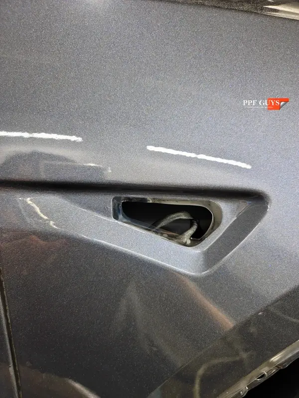 Silver Tesla Model Y, PPF. Photo 15 of 25.