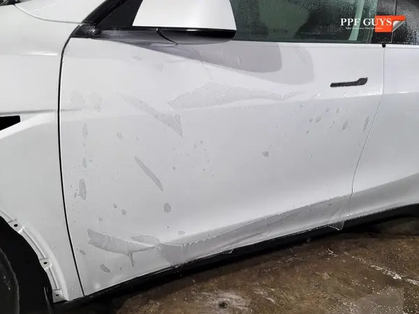 White Tesla Model Y, Full body XPEL Stealth satin finish PPF. Photo 11 of 54.