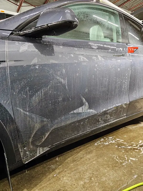 Silver Tesla Model Y, Full body Ultimate Fusion, blacked out emblems. Photo 19 of 45.