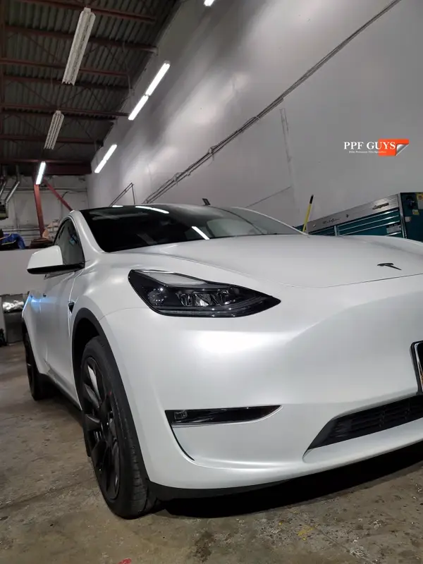 White Tesla Model Y, Full body XPEL Stealth satin finish PPF. Photo 40 of 54.