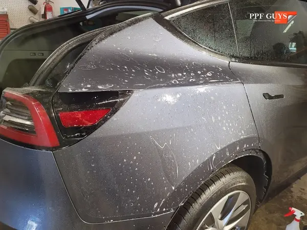 Grey Tesla Model Y, PPF. Photo 12 of 13.