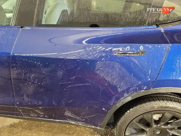 Tesla Model Y, Front end and doors. Photo 9 of 12.