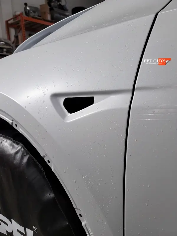 White Tesla Model Y, Stealth. Photo 40 of 42.