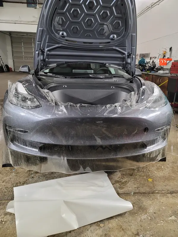Silver Tesla Model 3, Front end and rear fenders. Photo 12 of 16.