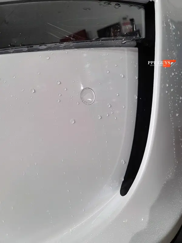 White Tesla Model X, Front end, rear bumper. Photo 10 of 15.