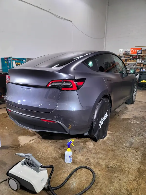 Silver Tesla Model Y, Stealth. Photo 11 of 29.