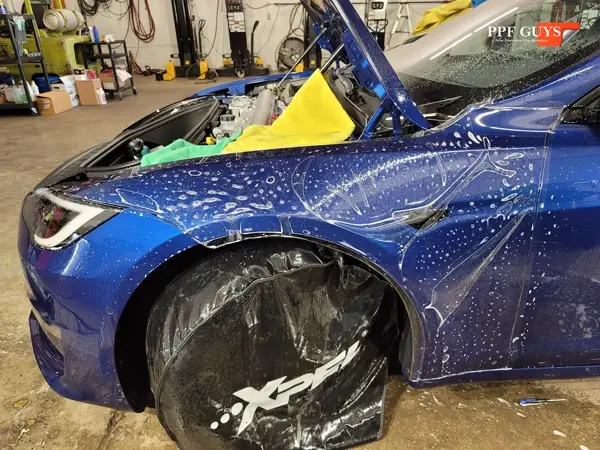 Blue Tesla Model S, Full body PPF and ceramic coating. Photo 12 of 40.