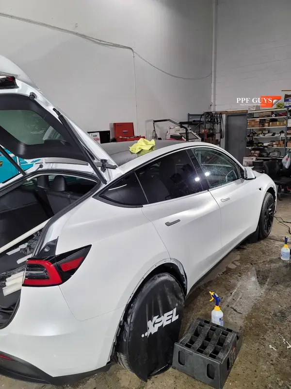 White Tesla Model Y, Full body XPEL Stealth satin finish PPF. Photo 25 of 54.