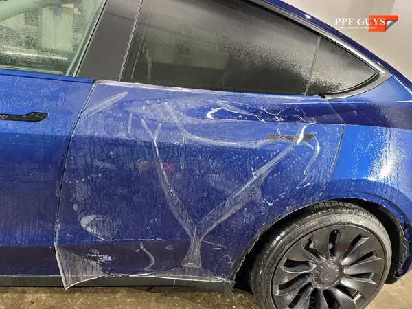 Blue Tesla Model Y, Full body PPF, XPEL Ultimate Plus. Photo 17 of 20.