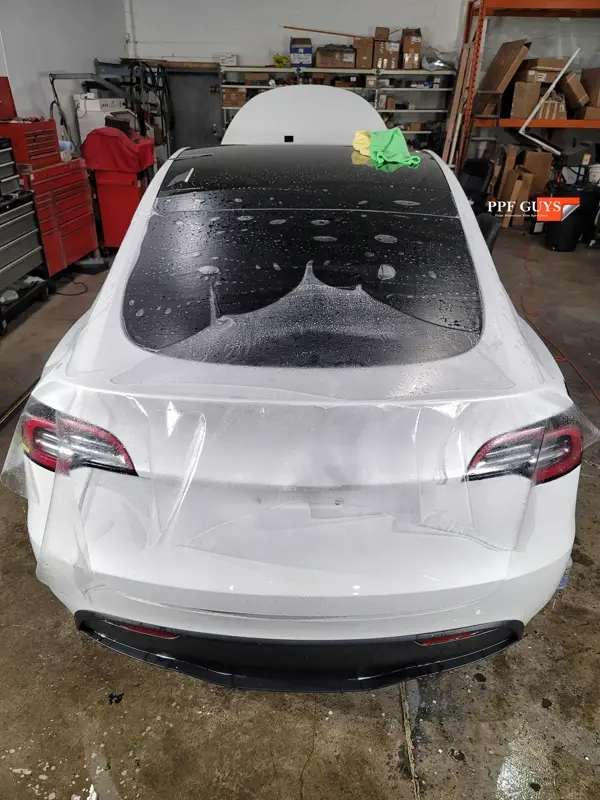 White Tesla Model Y, Full body XPEL Stealth satin finish PPF. Photo 27 of 54.