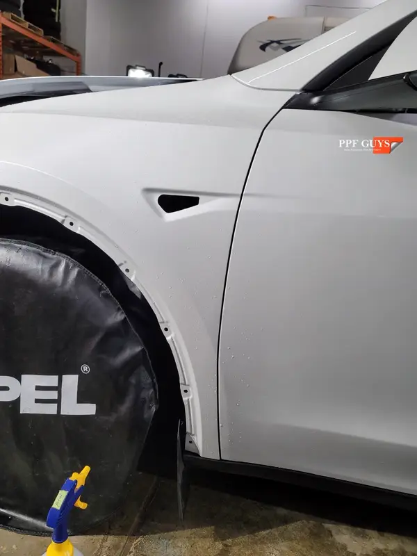 White Tesla Model Y, Stealth. Photo 41 of 42.
