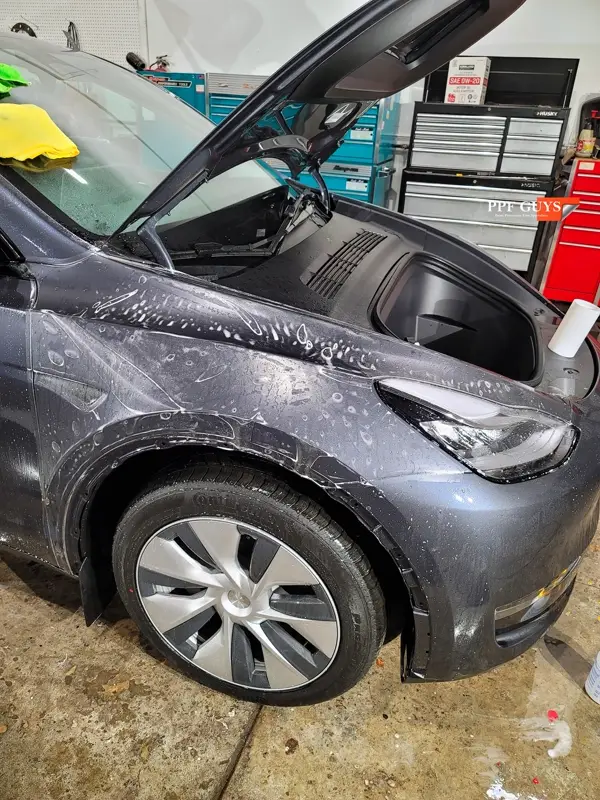 Silver Tesla Model Y, Stealth. Photo 25 of 29.