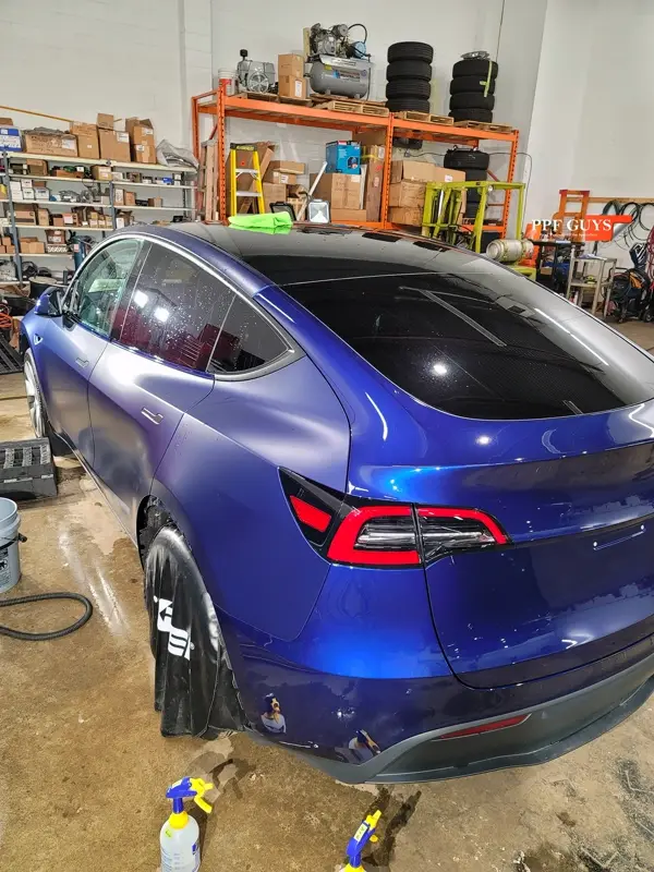 Blue Tesla Model Y, Stealth PPF. Photo 9 of 20.