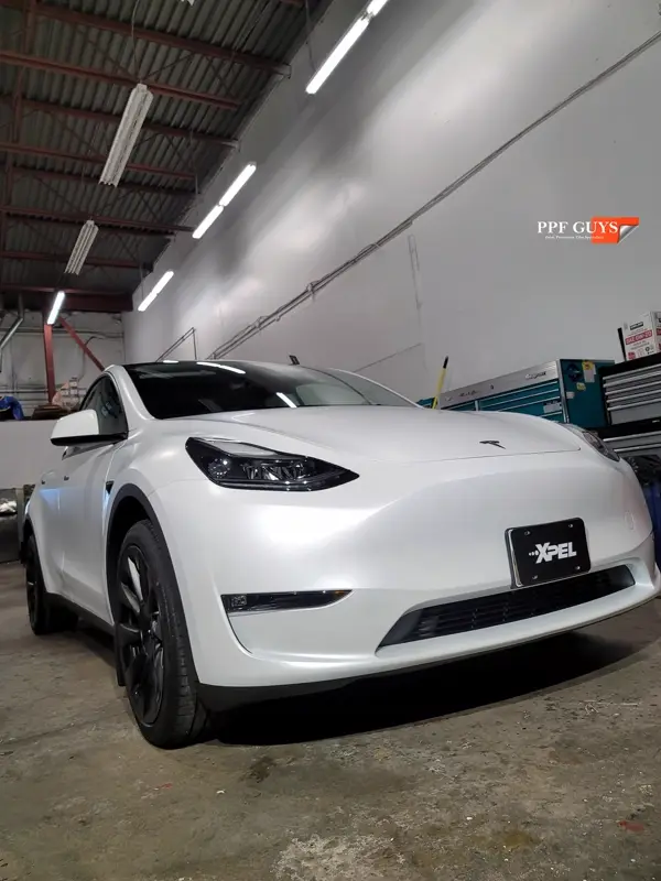 White Tesla Model Y, Full body XPEL Stealth satin finish PPF. Photo 39 of 54.