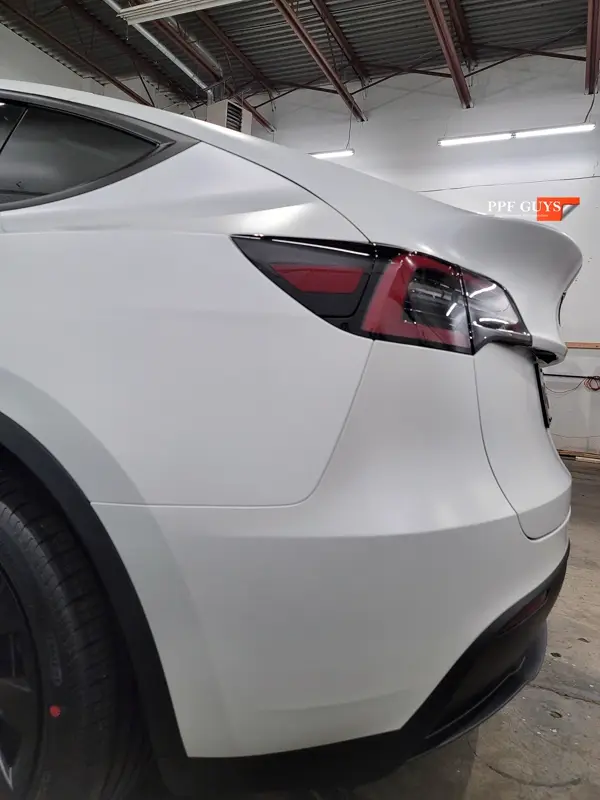 White Tesla Model Y, Full body XPEL Stealth satin finish PPF. Photo 46 of 54.