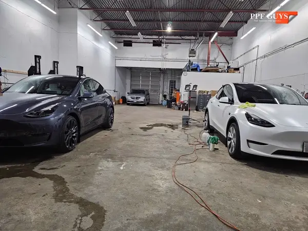 Silver Tesla Model Y, Full body Ultimate Fusion, blacked out emblems. Photo 17 of 45.