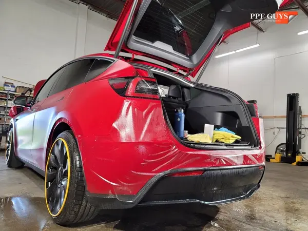 Red Tesla Model Y, Stealth. Photo 32 of 48.