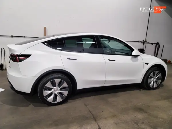 White Tesla Model Y, XPEL Stealth, ceramic, painted emblems. Photo 26 of 34.