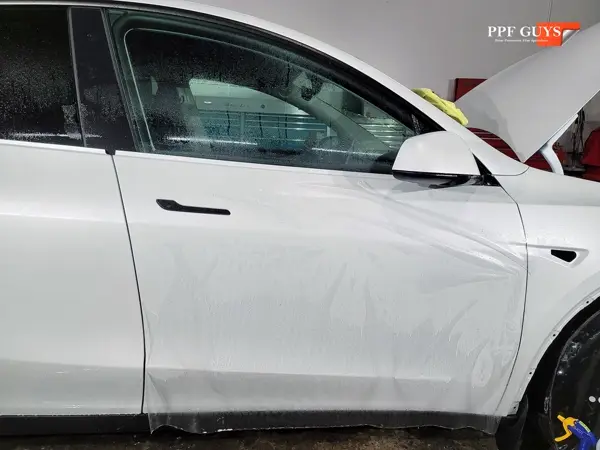 White Tesla Model Y, Full body XPEL Stealth satin finish PPF. Photo 20 of 54.