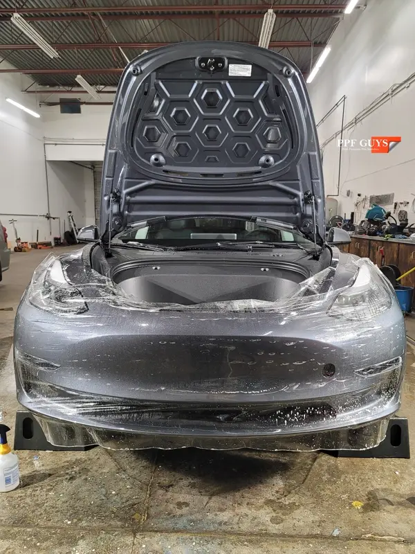 Silver Tesla Model 3, Front end and rear fenders. Photo 14 of 16.