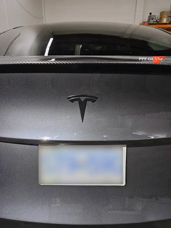 Silver Tesla Model Y, Full body Ultimate Fusion, blacked out emblems. Photo 36 of 45.