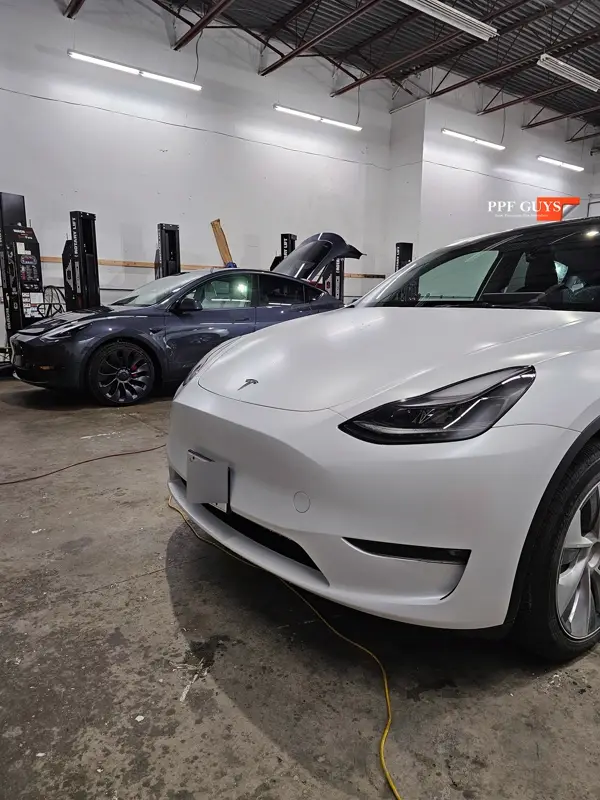 Silver Tesla Model Y, Full body Ultimate Fusion, blacked out emblems. Photo 16 of 45.