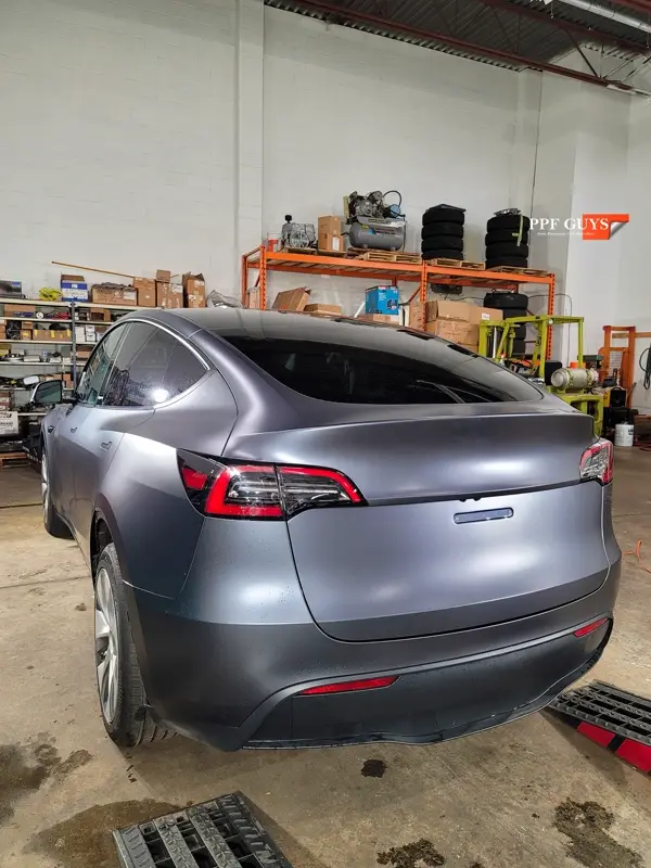 Silver Tesla Model Y, Stealth. Photo 18 of 29.