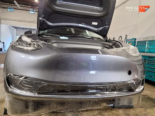 Grey Tesla Model Y, PPF. Photo 9 of 13.